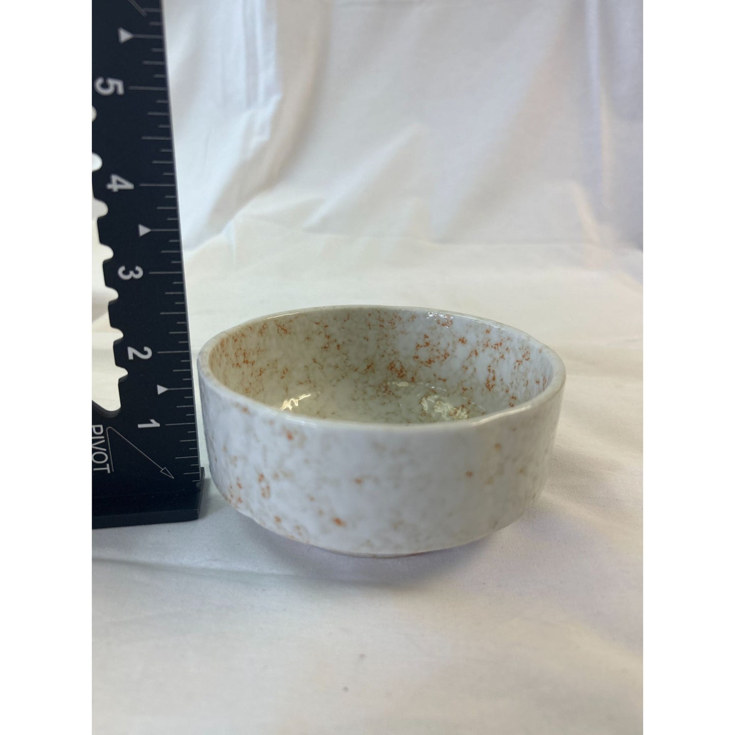 Handcrafted Ceramic Bowl With Speckled Design - 2" Height X 4" Diameter