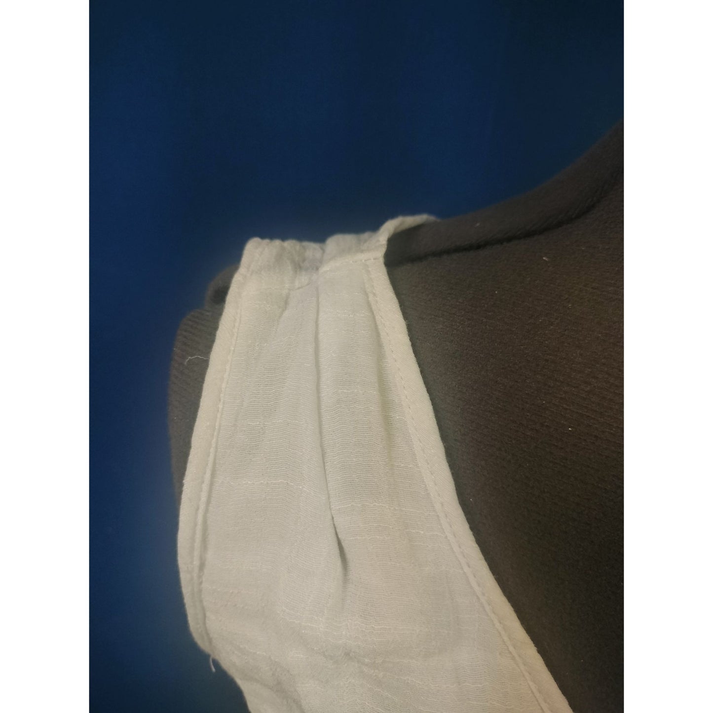 White Sleeveless V-Neck Button-Front Dress With Tie Waist & Asymmetrical Hem