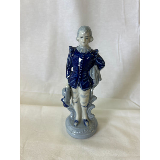 Vintage Porcelain Figurine Of Boy In Blue Coat Holding Hat & Scroll