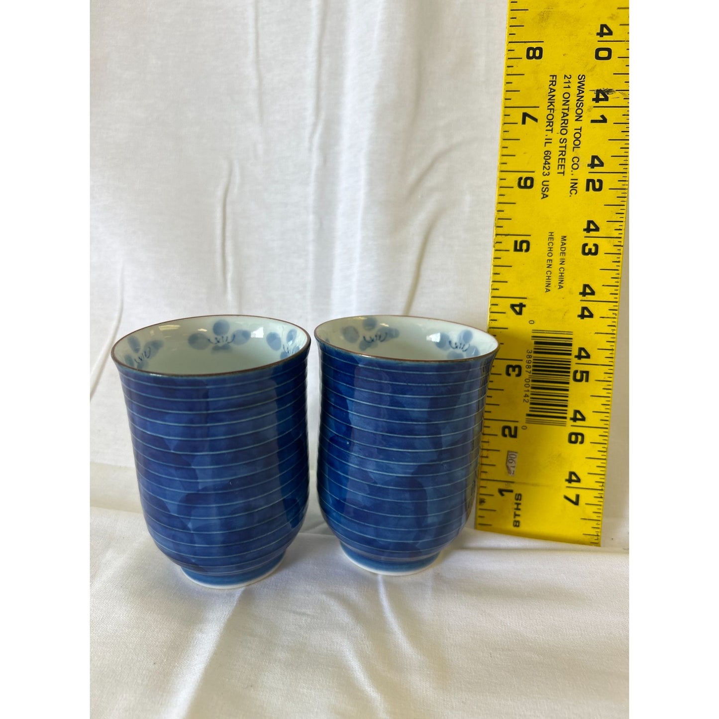 Set Of 2 Blue Ceramic Japanese Tea Cups With Hand-Painted Floral Interior Design