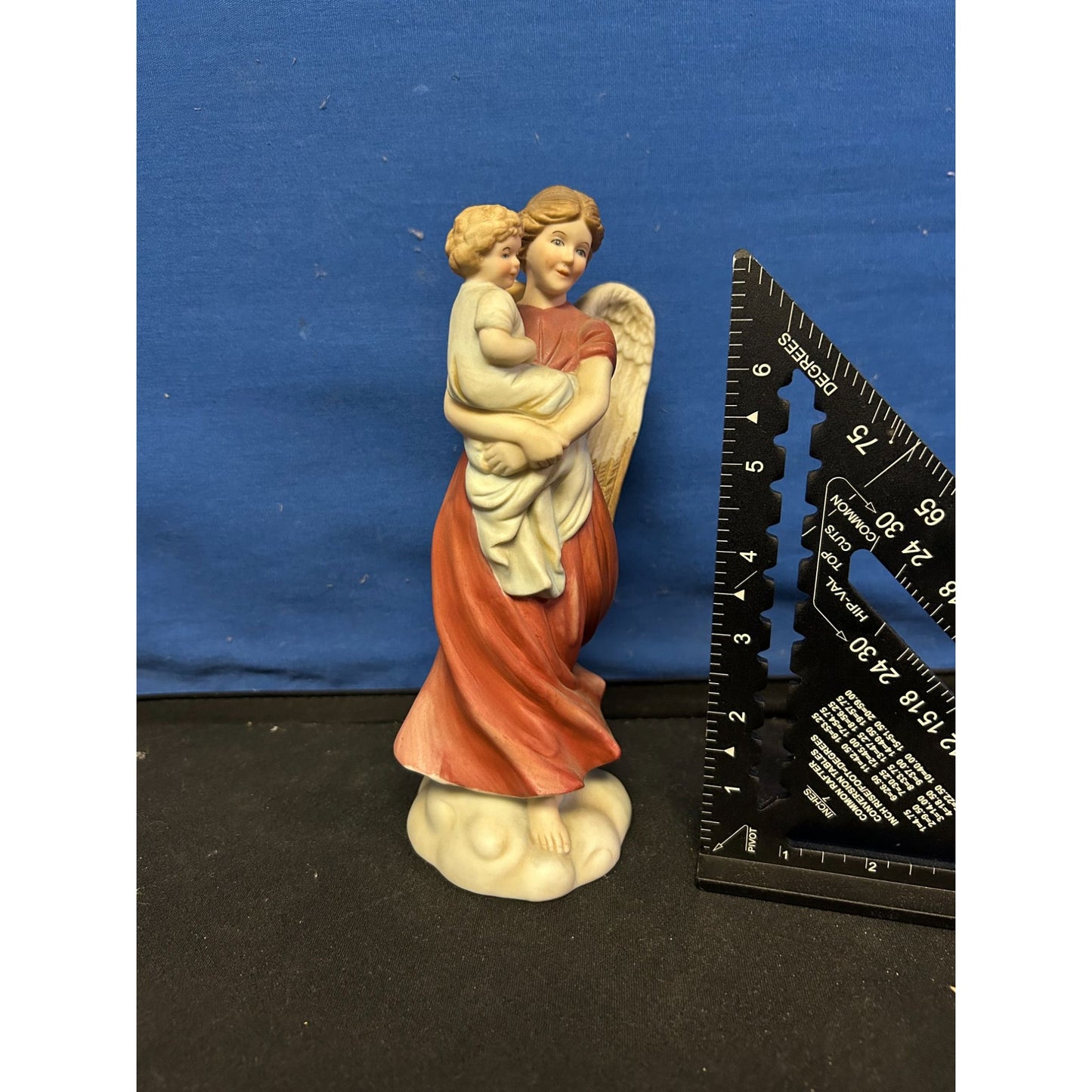 Hand-Painted Ceramic Angel Figurine Holding Child With Golden Wings