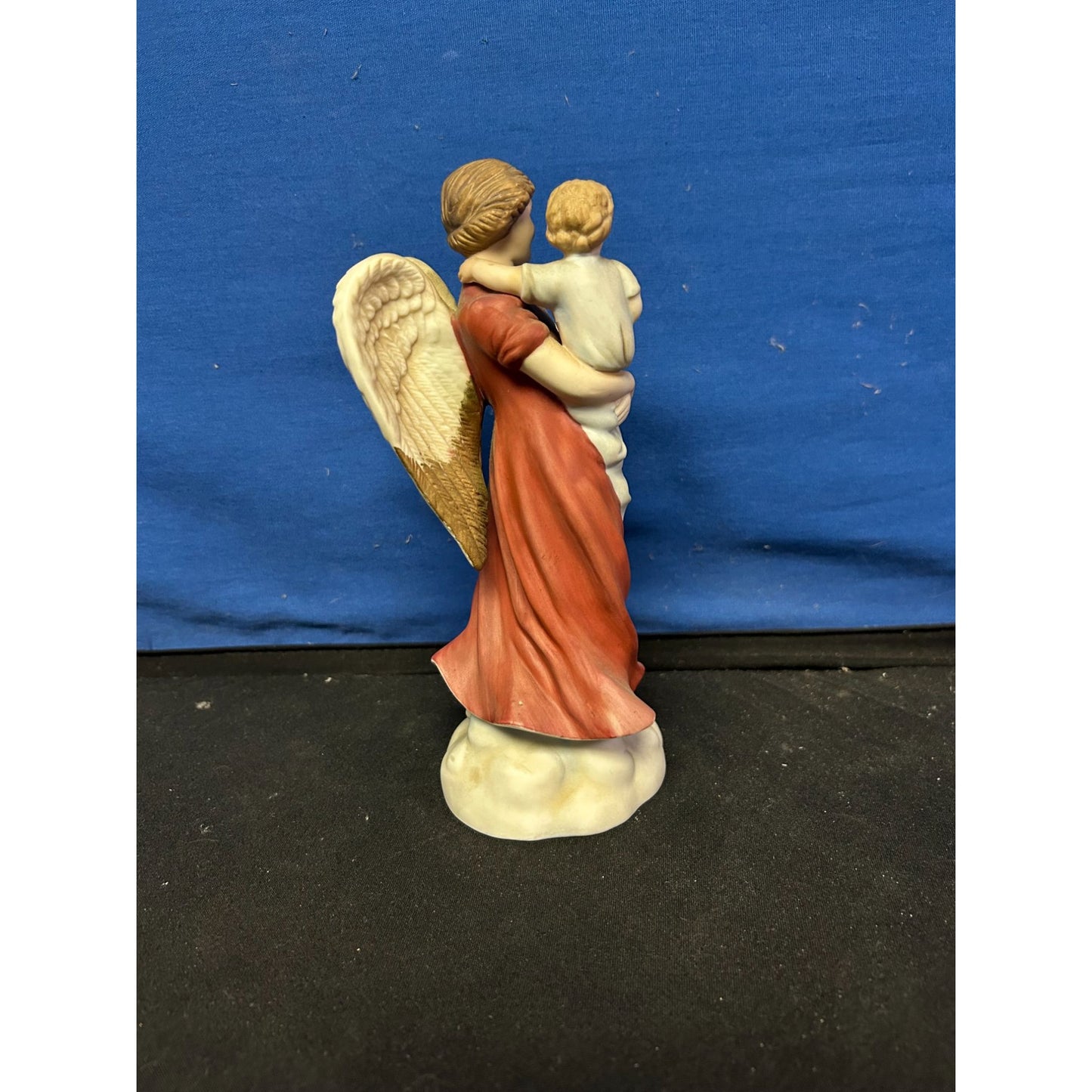 Hand-Painted Ceramic Angel Figurine Holding Child With Golden Wings